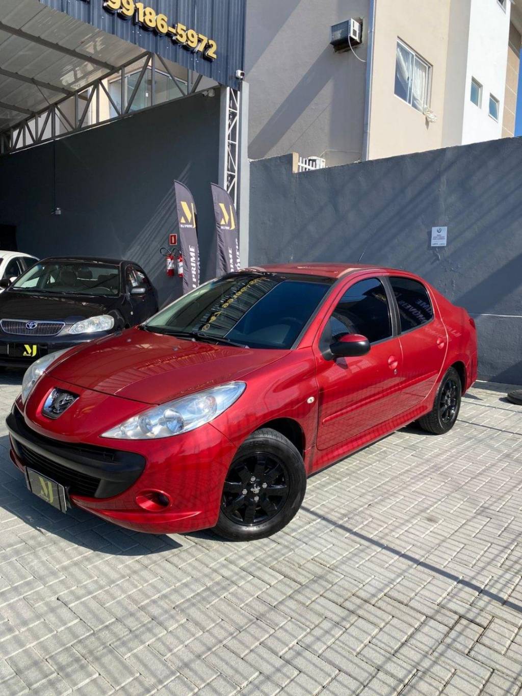 Peugeot 207 Passion Sed. Passion XR Sport 1.4 Flex 8V 4p    2010